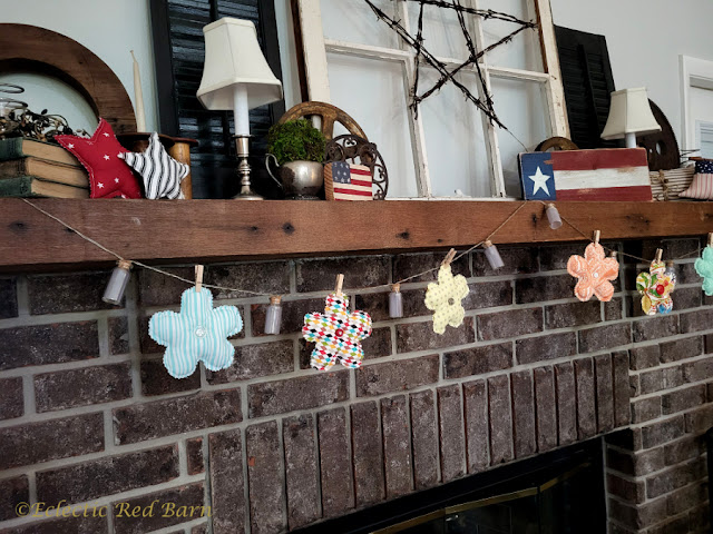 Garland of flowers. Share NOW. #garland, #flowers, #fabricflowers, #crafting, #eclecticredbarn